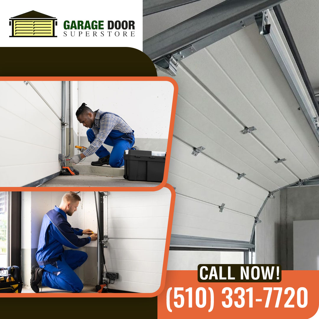 Professional technicians performing garage door safety inspection, hardware adjustment, and maintenance on a residential garage door at The Garage Door SuperStore.