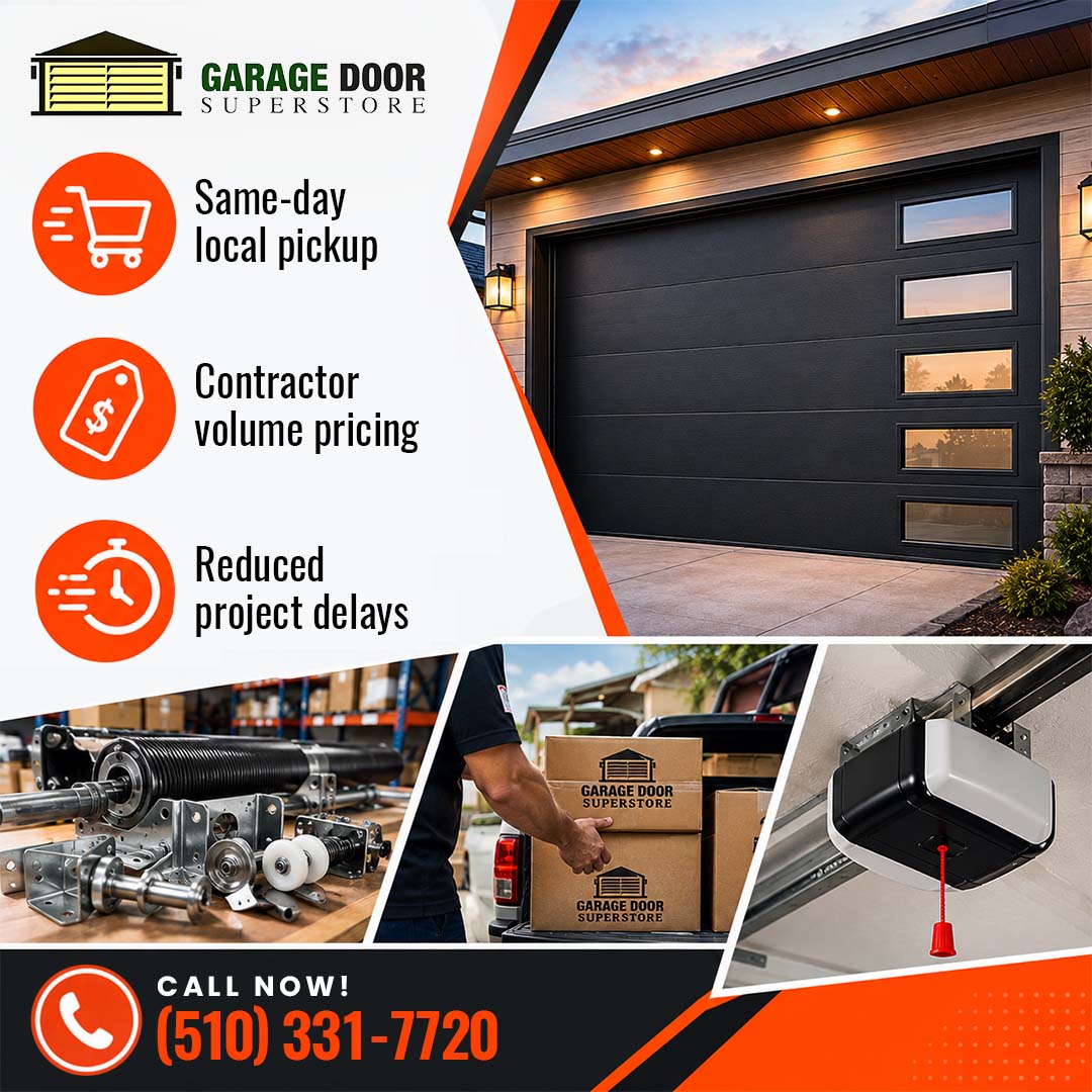 Modern dark garage door with vertical window panels, paired with lower insets of heavy-duty torsion springs, a contractor loading branded boxes into a truck bed, and an overhead opener motor.